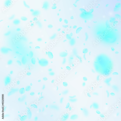 Turquoise flower petals falling down. Graceful rom