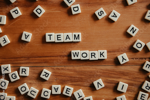 Team Work spelled out with scrabble words, Team building, Business, Work Together photo