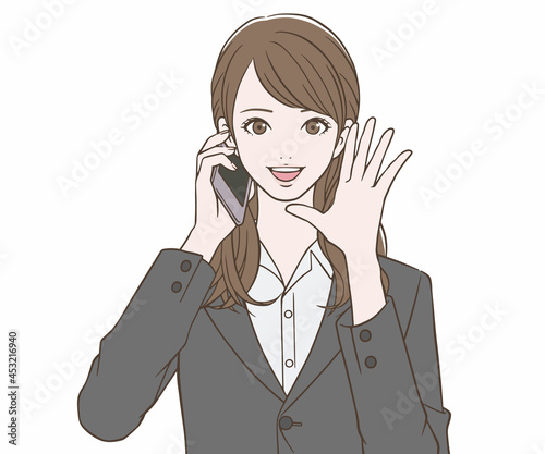 スマートフォンを持ち、呼びかけるスーツの女性
