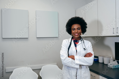 Portrait of pediatrician in her office photo