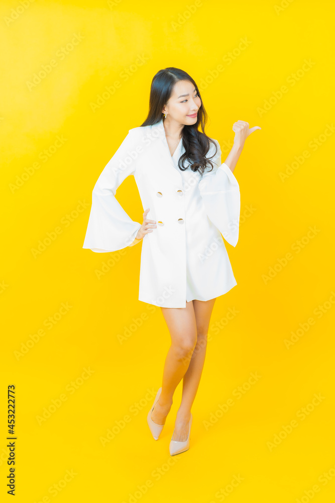 Portrait beautiful young asian woman smile with action Portrait beautiful young asian woman smile with action