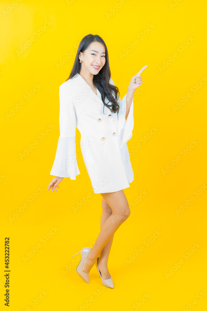 Portrait beautiful young asian woman smile with action Portrait beautiful young asian woman smile with action