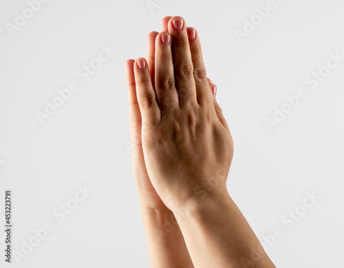 praying hands isolated on white background. Praying woman hands isolated on white background.