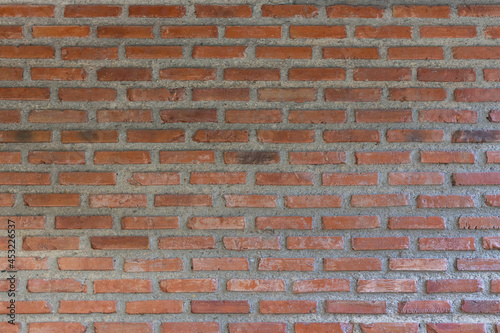 The old orange brick wall background