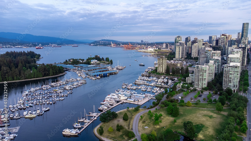 Aerial photo of Coal Harour in Downtown Vancouver with view of Port of Vancouver and Burrard Inlet in the background