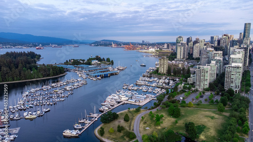 Aerial photo of Coal Harour in Downtown Vancouver with view of Port of Vancouver and Burrard Inlet in the background