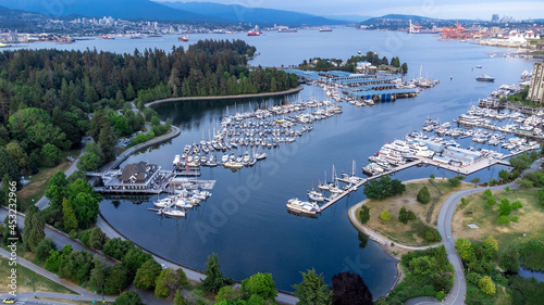 Aerial photo of Stanley Park with Burrard Inlet and Vancouver Yacht club in view 