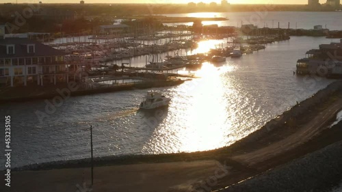 Wallpaper Mural Luxury Ship Sailing Towards The Harbour Of New Orleans Yacht Club At Sunset In New Orleans, Louisiana, USA. - Aerial Torontodigital.ca