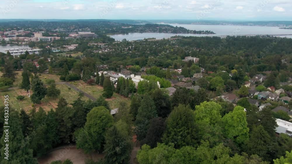 Aerial: Volunteer Park and city skyline. Seattle, Washington, USA Aerial: Volunteer Park and city skyline. Seattle, Washington, USA