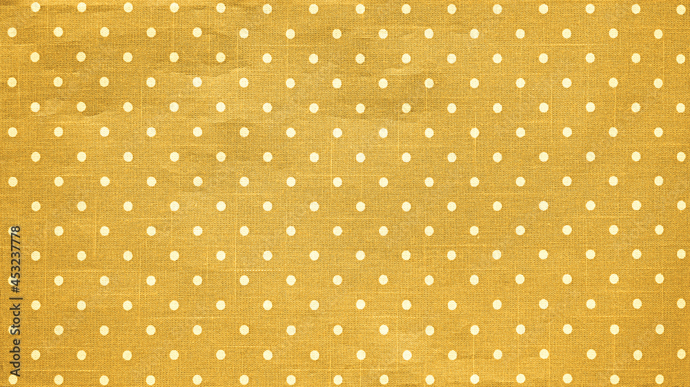 Polka dots pattern and yellow tone of cloth, Texture of silk fabric cotton, Wallpaper background