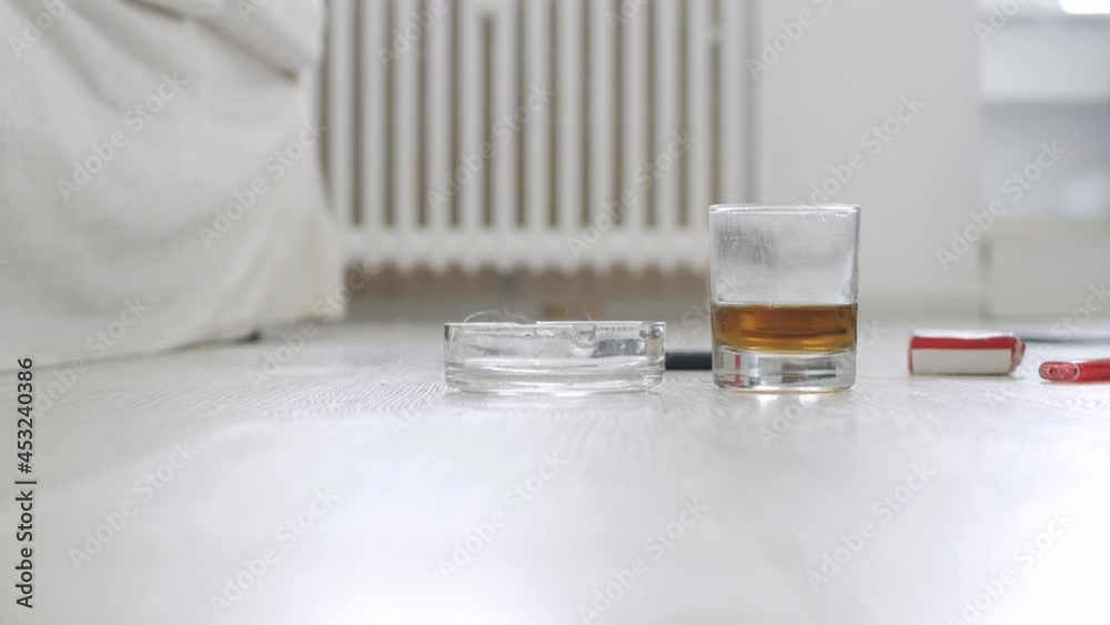Shooting with a Person Sitting in the Bedroom, Smoking a Cigarette, and Drinking Alcohol. Shooting with a Person Sitting in the Bedroom, Smoking a Cigarette, and Drinking Alcohol.