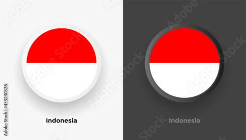 Set of two Indonesia flag buttons in black and white background. Abstract shiny metallic rounded buttons with national country flag