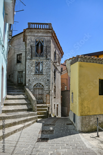 Photos A small street between the old houses of Castelluccio Superiore, a small town in the province of Potenza in Basilicata, Italy