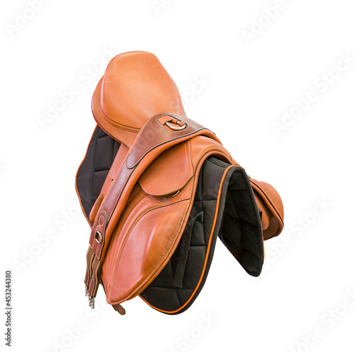 Competitive saddle of brown leather on the side on a white background