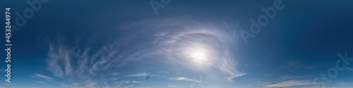 Blue sky panorama with Cirrus clouds. Seamless hdr 360 degree pano in spherical equirectangular format. Complete zenith for 3D visualization, game and sky replacement for aerial drone 360 panoramas.