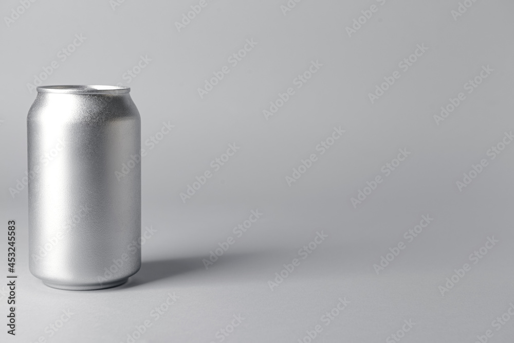 Can of soda on grey background Can of soda on grey background