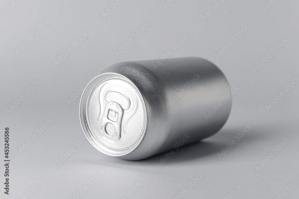 Can of soda on grey background Can of soda on grey background