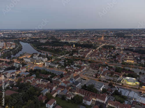 Aerial view of world famous skyline of Regensburg in Bavaria, Germany with cathedral and old town at night © Robert Ruidl