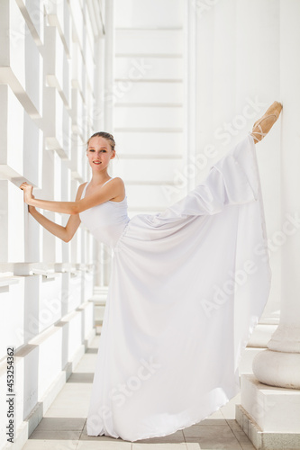 young ballerina dancing in the street