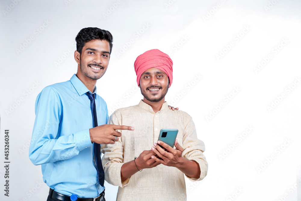 Technology concept : officer showing some detail to farmer in smartphone. Technology concept : officer showing some detail to farmer in smartphone.