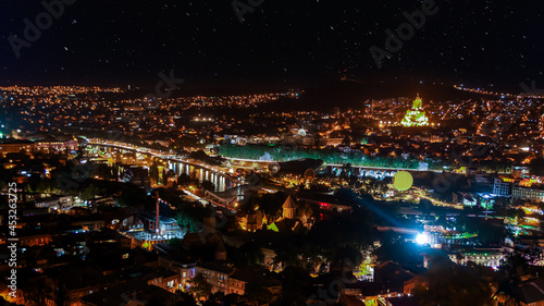 Tbilisi city panorama at night. Old city, new Summer Rike park, river Kura, the European Square and the Bridge of Peace © Uldis Laganovskis