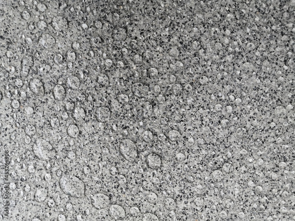 Droplet on Explsed or exposed aggregate finish surface floor.gray.