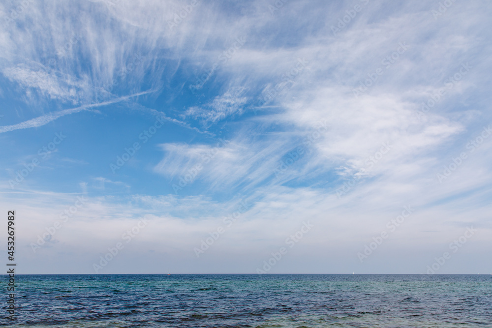 Sky with white clouds over the sea landscape