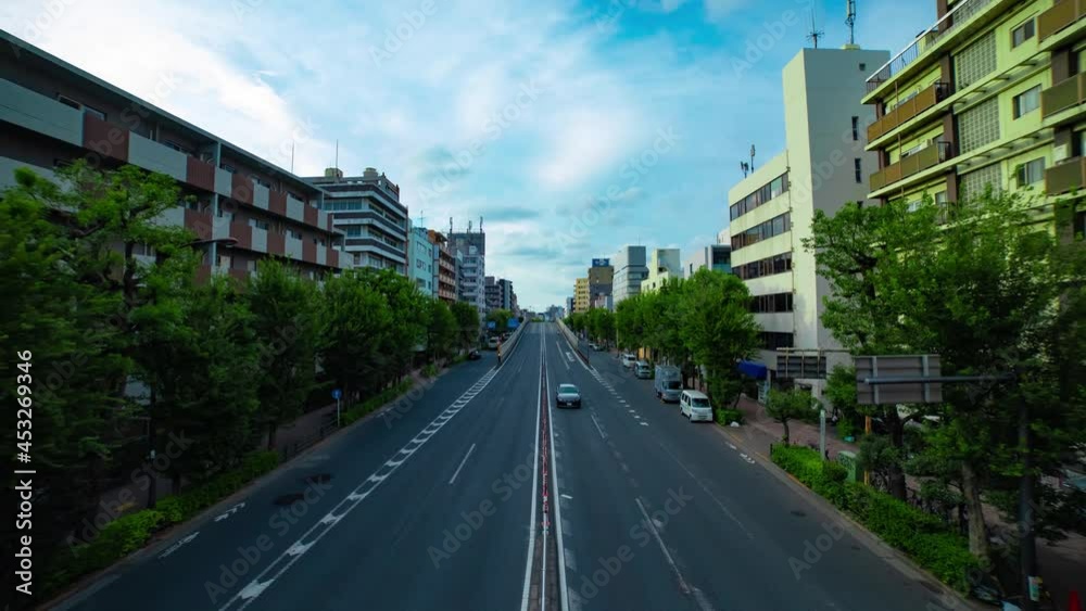 A timelapse of downtown street at the avenue daytime wide shot tilt A timelapse of downtown street at the avenue daytime wide shot tilt