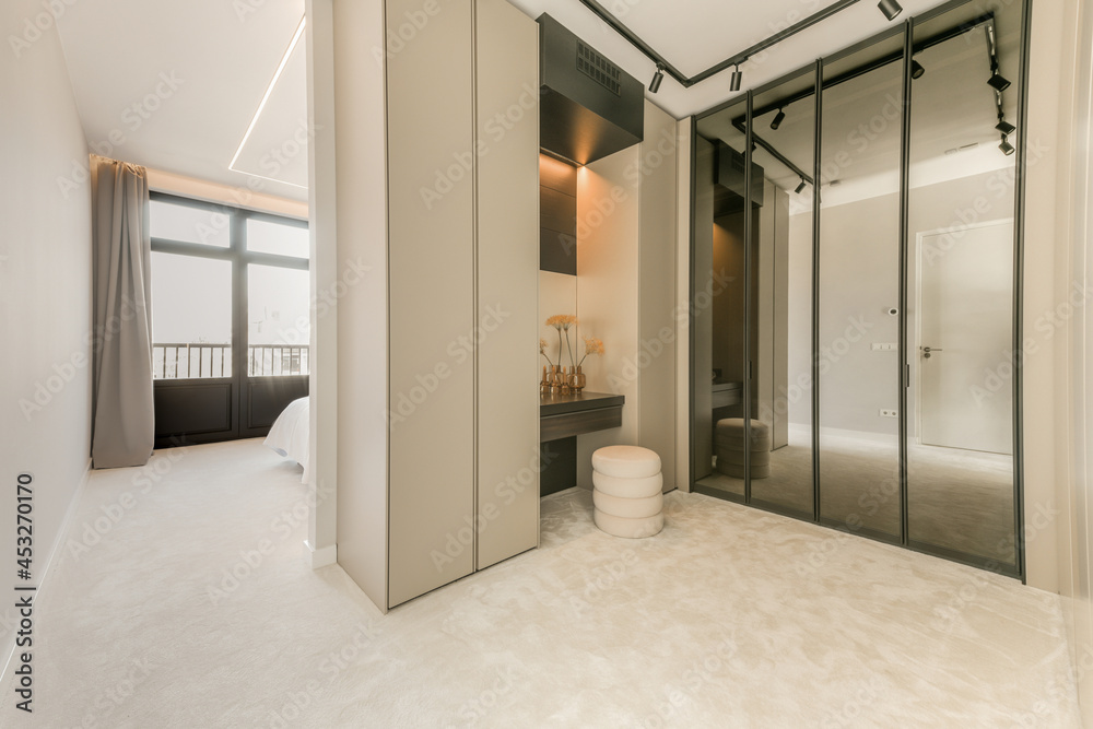 Interior of room with wardrobe in modern apartment Interior of room with wardrobe in modern apartment