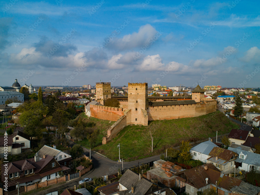 Morning flight over Lubart's castle and the church of the apostles Peter and Paul. Lutsk.