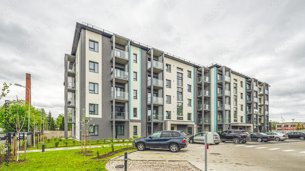 Exterior of modern living building in residential area of city. Exterior of modern living building in residential area of city.