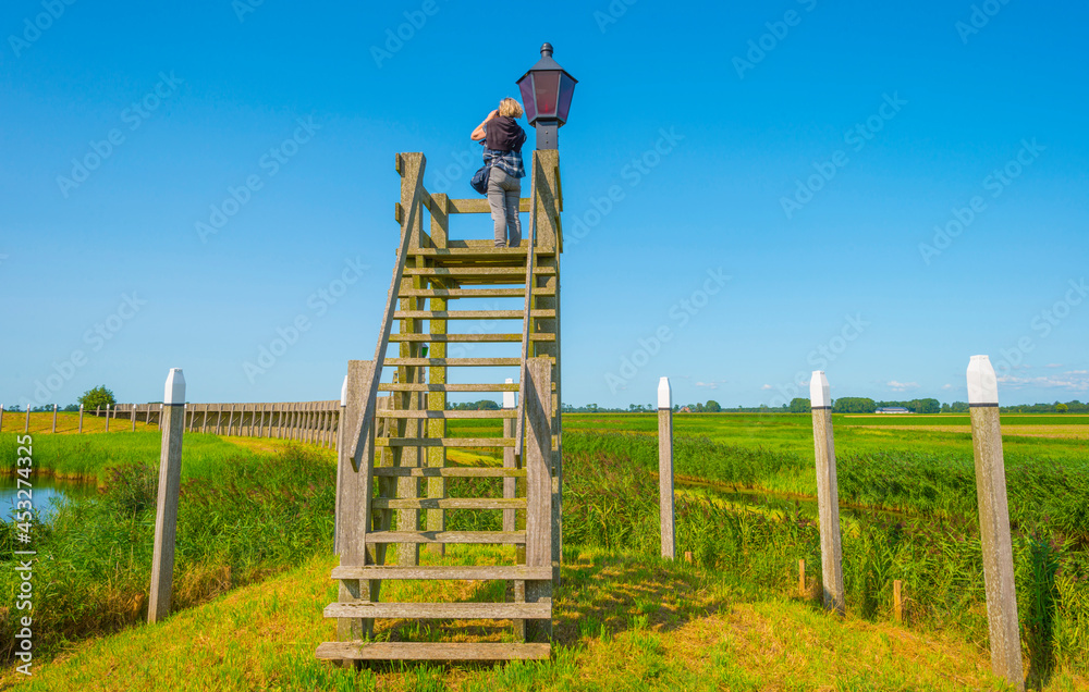 Unesco protected outline of an ancient former harbor of an island swallowed by reclaimed new land under a blue sky in summer, Noordoostpolder, Schokland, Flevoland, Netherlands, August 23, 2021 Unesco protected outline of an ancient former harbor of an island swallowed by reclaimed new land under a blue sky in summer, Noordoostpolder, Schokland, Flevoland, Netherlands, August 23, 2021