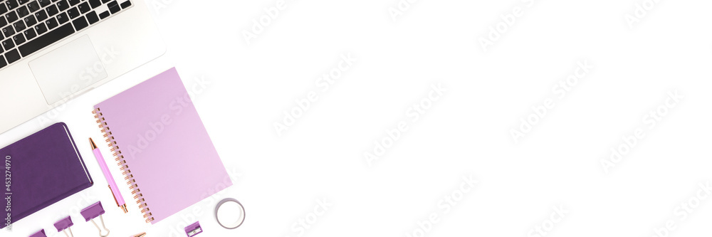 Banner with laptop and purple stationery on a white background. Neat workspace for homeschooling. Banner with laptop and purple stationery on a white background. Neat workspace for homeschooling.