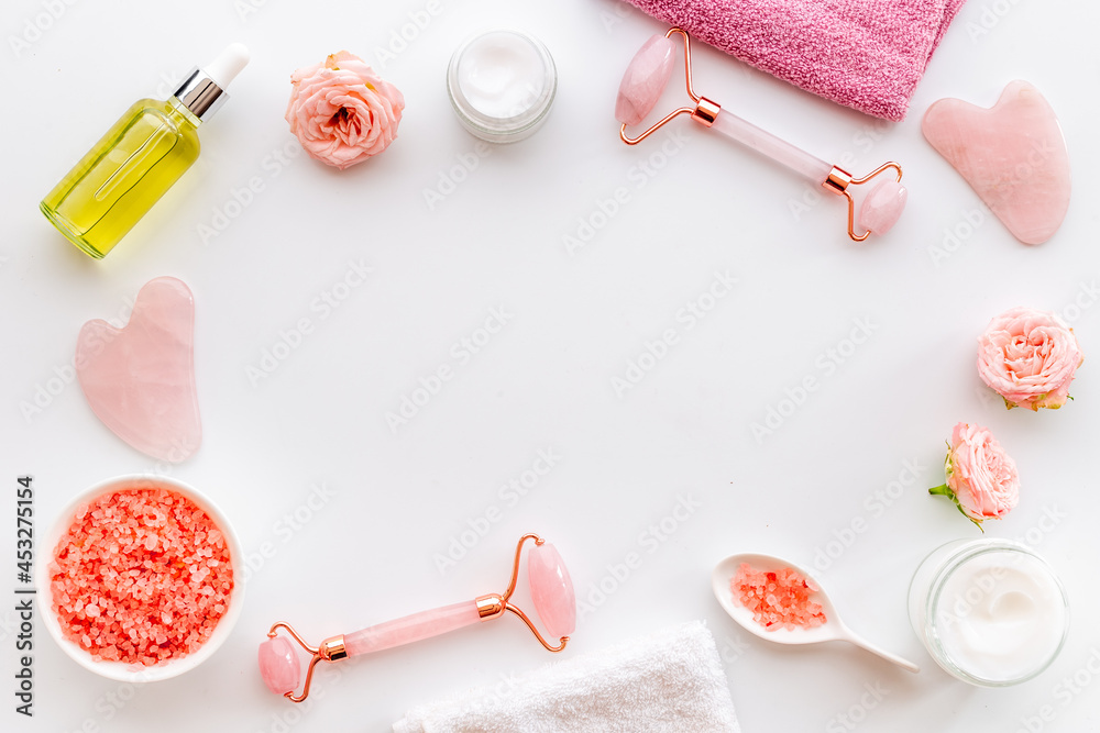 Facial spa skin care cosmetics products with stone massage roller and gua sha Facial spa skin care cosmetics products with stone massage roller and gua sha