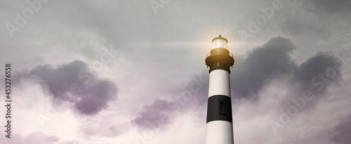 The lighthouse with soft blurry color sky background. North Carolina's Bodie Island Lighthouse, USA.