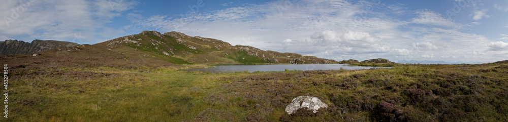 Ireland lake and hills. Westcoast. Heather fields.