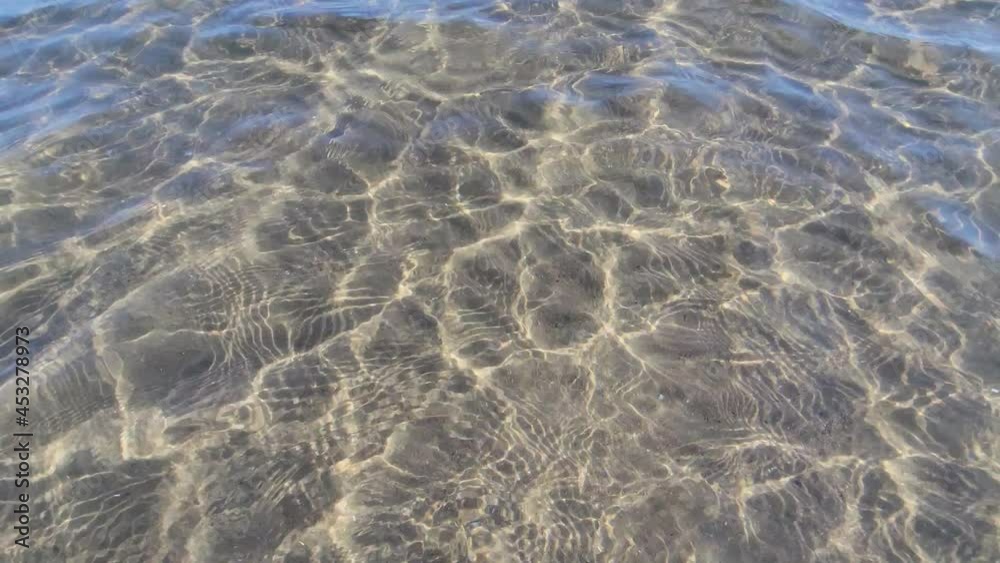 Transparent sea water on the beach Transparent sea water on the beach