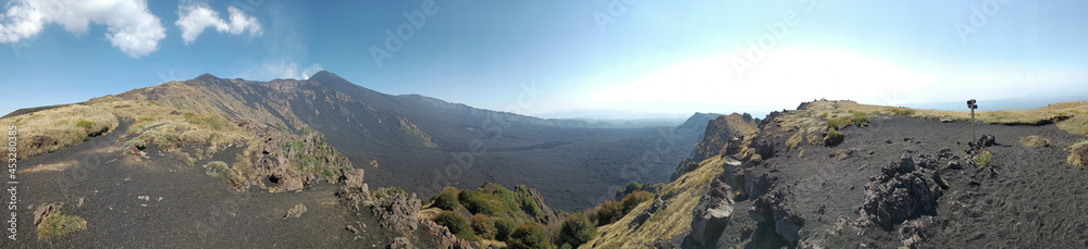 Etna - Panoramic  view at top crater and on Valle del Bove during summer sunny day in Sicily