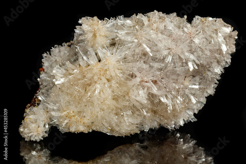 Macro mineral stone crystals Hemimorphite rock on a black background