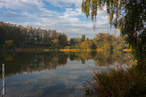 Clouds and reflections on the autumn pond