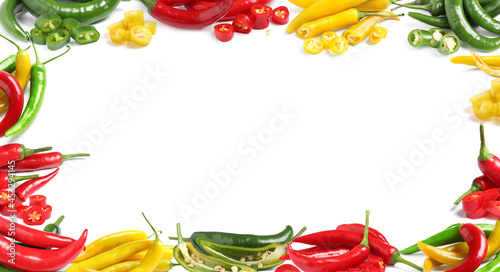 Frame made of different chili peppers on white background