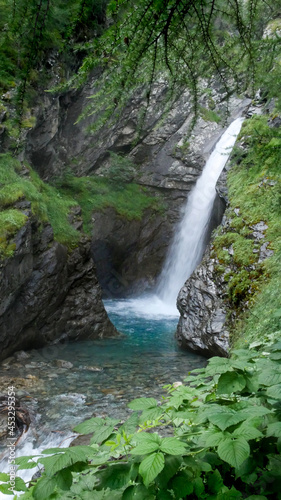 france Waterfall with long exposure and blurred water flow in Ecrins national park 