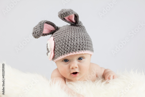 Portrait of a little child in a bunny hat