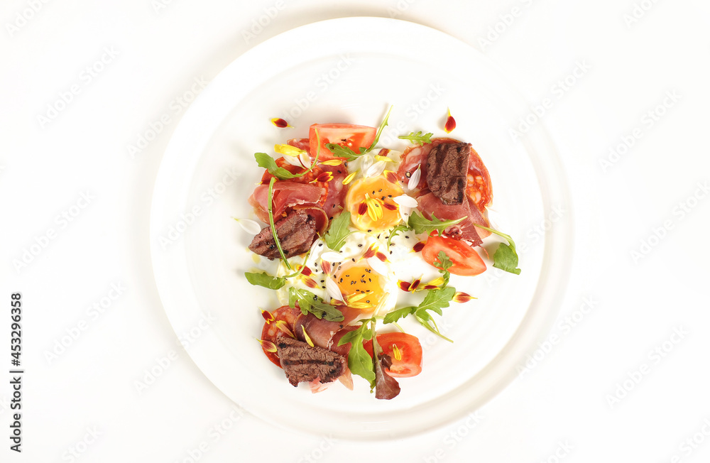 Fine dining breakfast. Fried eggs with beef filet. Fine dining breakfast. Fried eggs with beef filet.