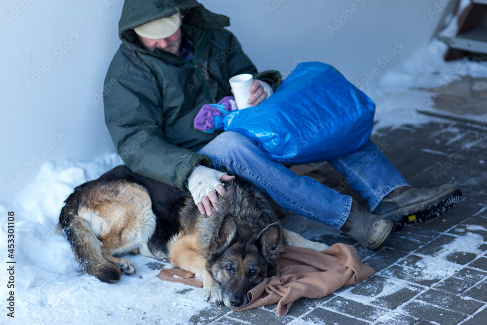 male homeless and his dog
 - obrazy, fototapety, plakaty 
