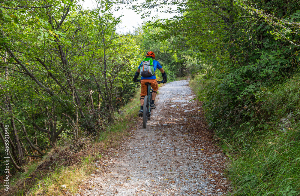 Biker on the hiking trail of the Biker on the hiking trail of the