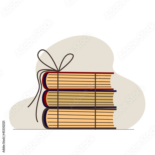 A stack of books tied with a rope.