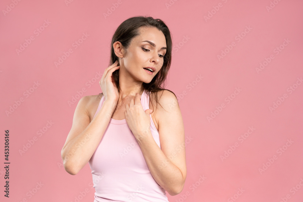 Portrait of a beautiful young female with no makeup, skin care concept, attractive brunette girl on pink background. Human emotions, facial expression concept. Facial expressions, emotions, feelings. Portrait of a beautiful young female with no makeup, skin care concept, attractive brunette girl on pink background. Human emotions, facial expression concept. Facial expressions, emotions, feelings.
