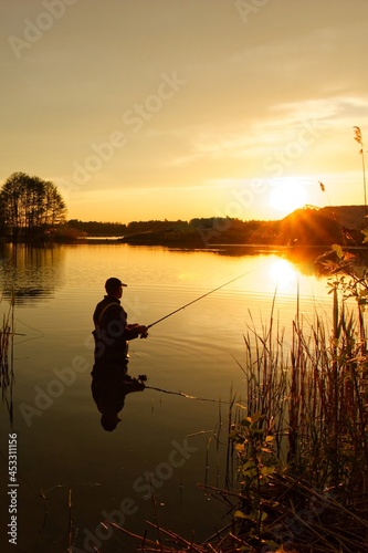 Angler silhouette during sunset