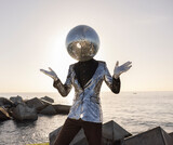 Mr disco ball dancing by the ocean